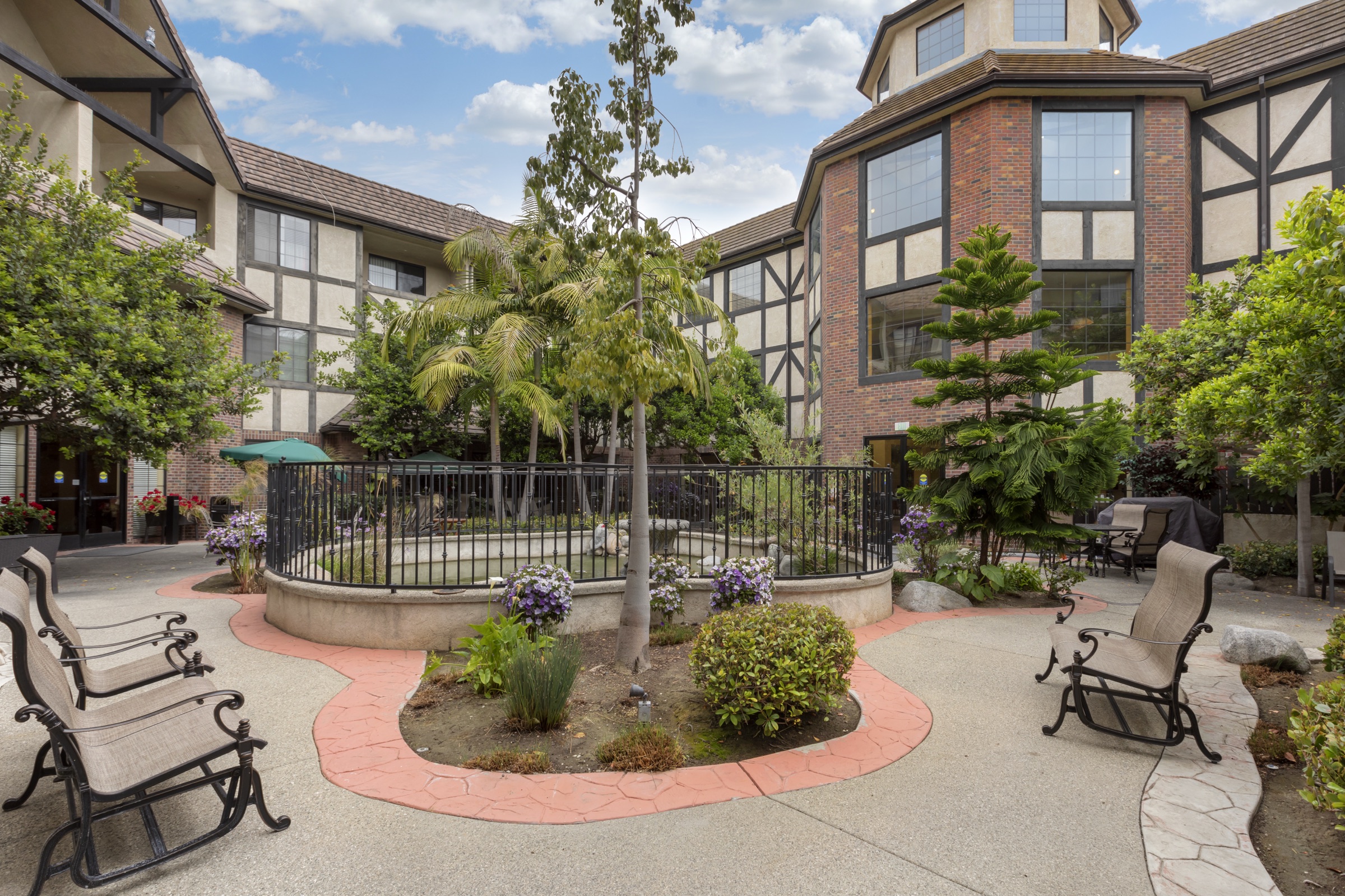 The enclosed courtyard, with benches and planted beds